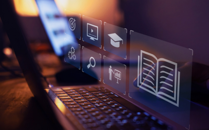 Laptop screen with holographic icons representing online education, video content, and search, symbolizing digital learning and student data collection.